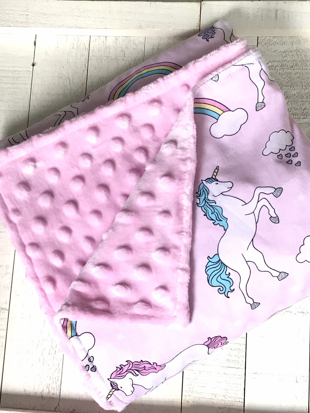 Baby Blanket in unicorns and rainbows pink cotton fabric forbaby girl with soft dimple dot minky back, personalized baby shower gift