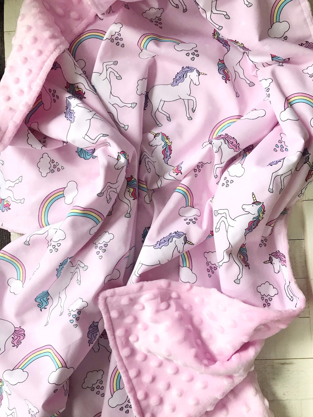 Baby Blanket in unicorns and rainbows pink cotton fabric forbaby girl with soft dimple dot minky back, personalized baby shower gift