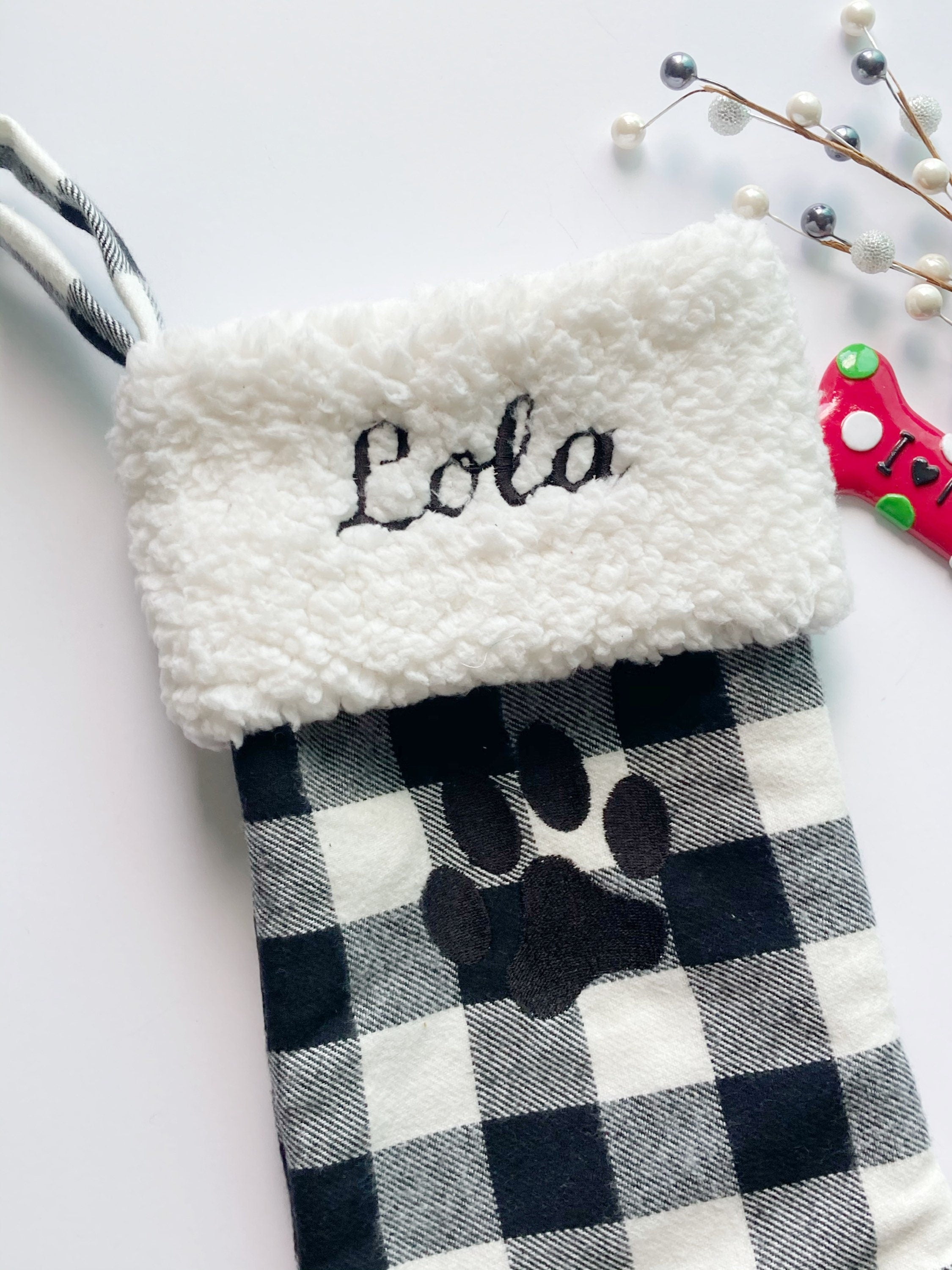 Personalized pet Christmas stocking: black and white buffalo plaid flannel for cat dog stocking fully lined embroidered paw 18”
