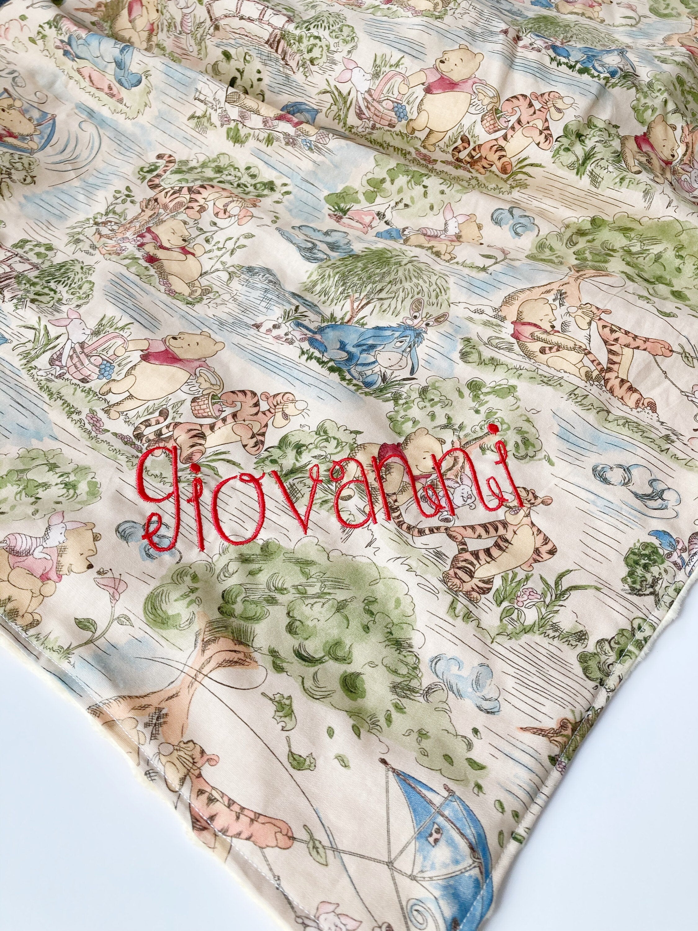 Baby blanket for nursery bedding,  personalized for girl made from Winnie the Pooh fabric in Cotton and pink soft minky baby shower gift