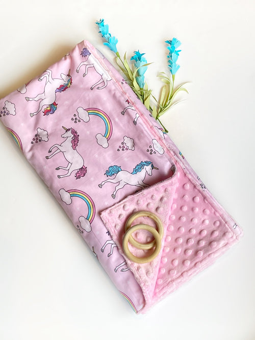 Baby Blanket in unicorns and rainbows pink cotton fabric forbaby girl with soft dimple dot minky back, personalized baby shower gift