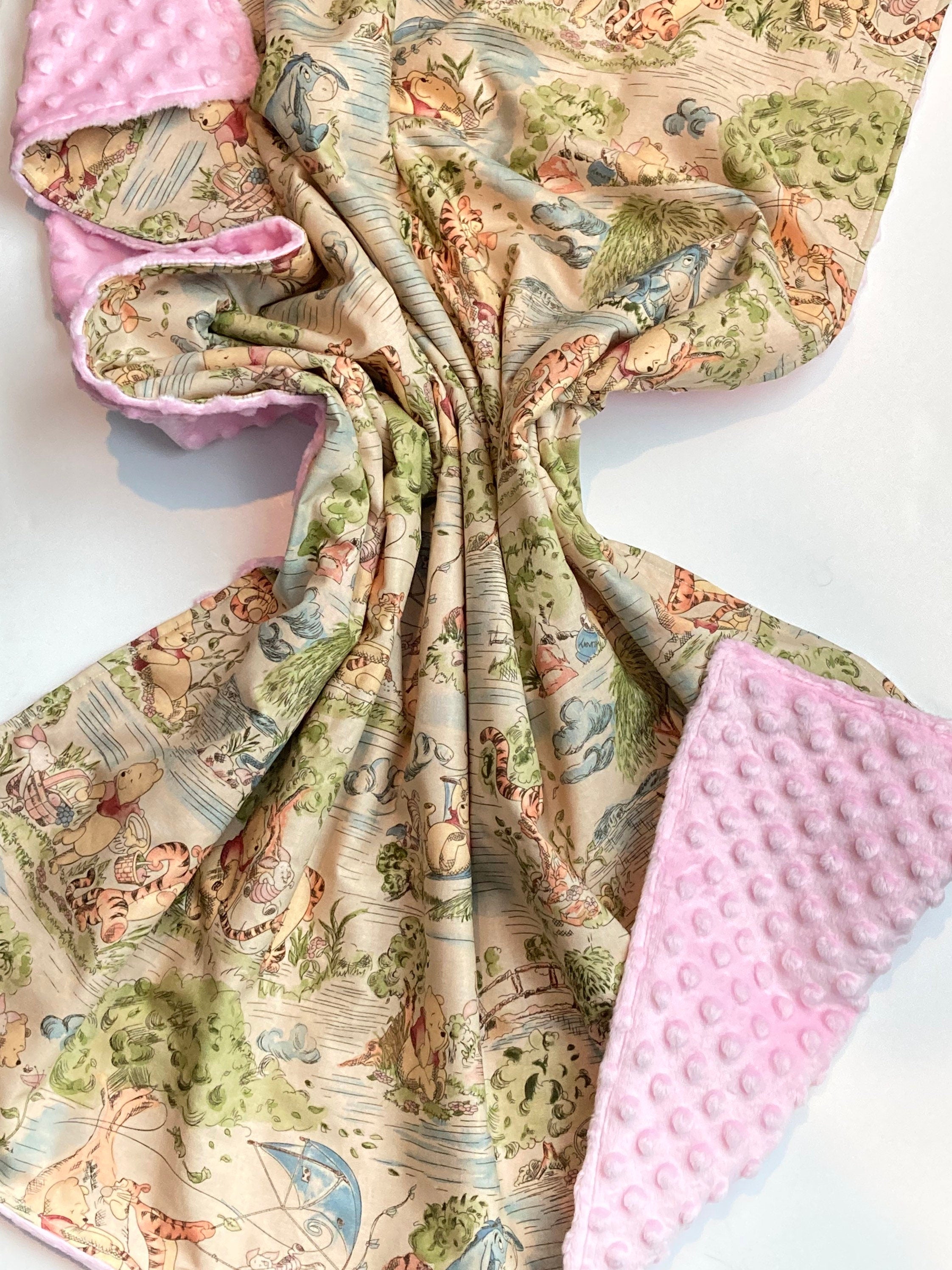 Baby blanket for nursery bedding,  personalized for girl made from Winnie the Pooh fabric in Cotton and pink soft minky baby shower gift