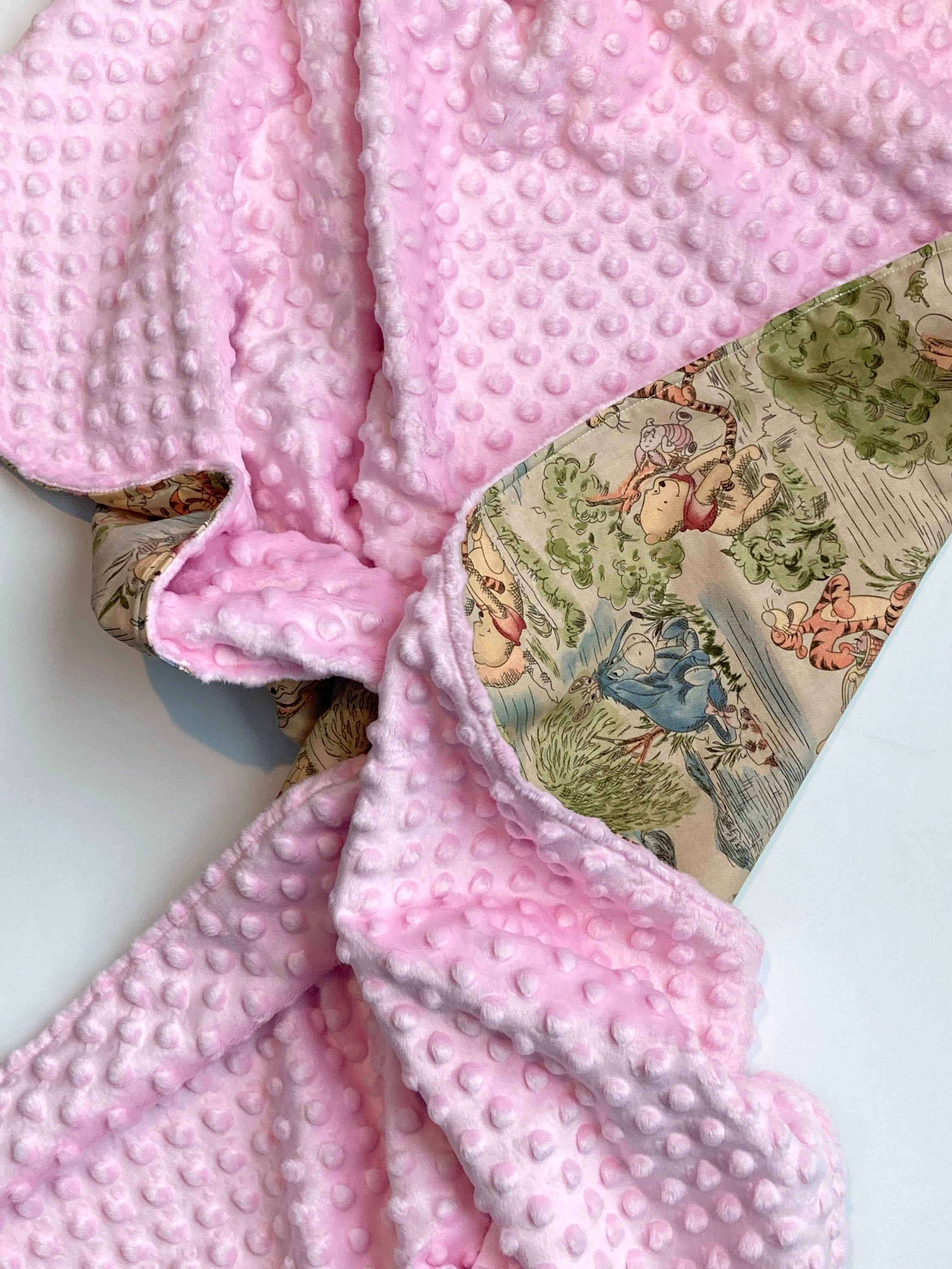 Baby blanket for nursery bedding,  personalized for girl made from Winnie the Pooh fabric in Cotton and pink soft minky baby shower gift