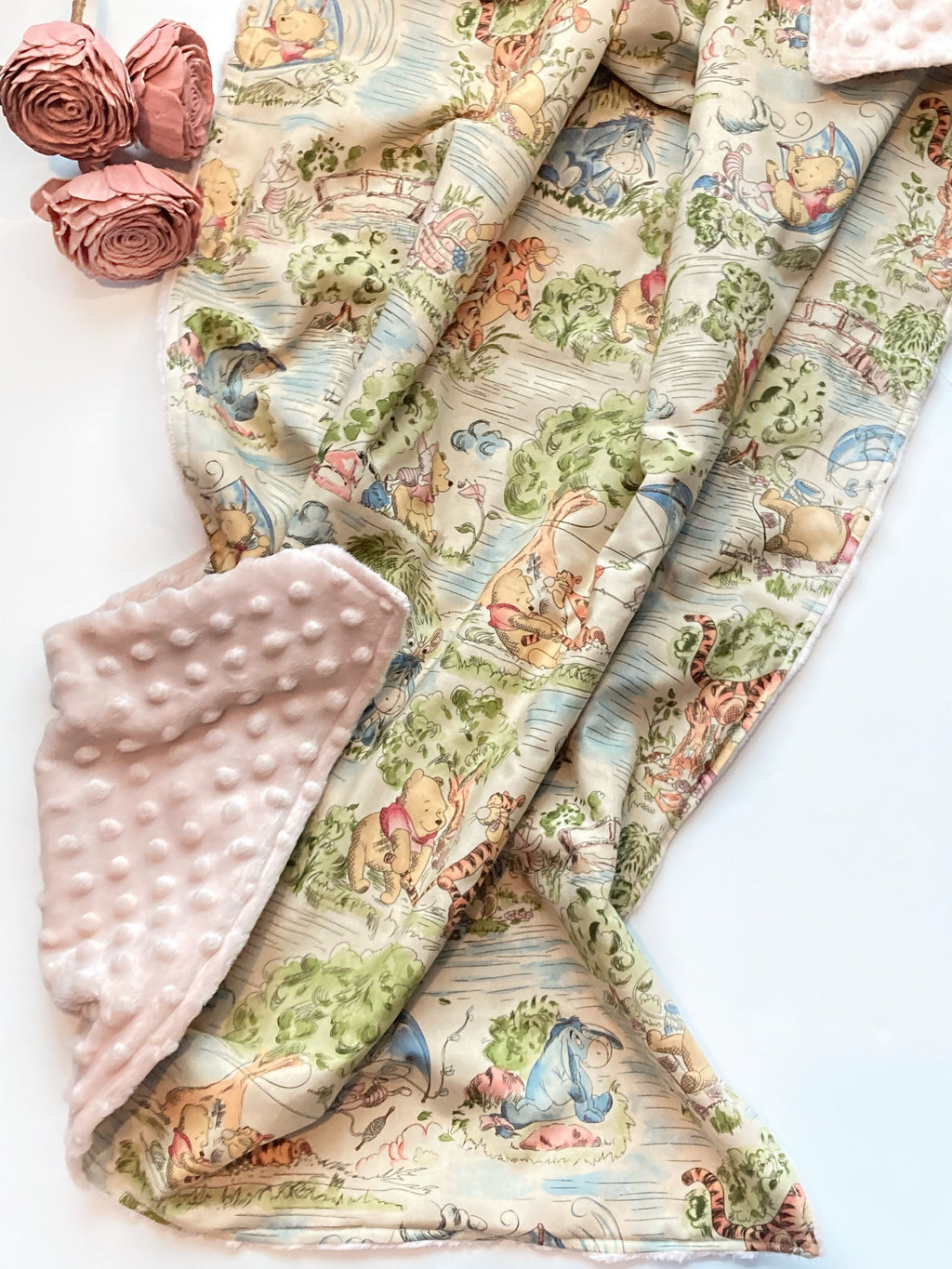 Baby blanket nursery bedding made from Winnie the Pooh fabric for boy or girl in Cotton and soft blush pink minky, personalized gift