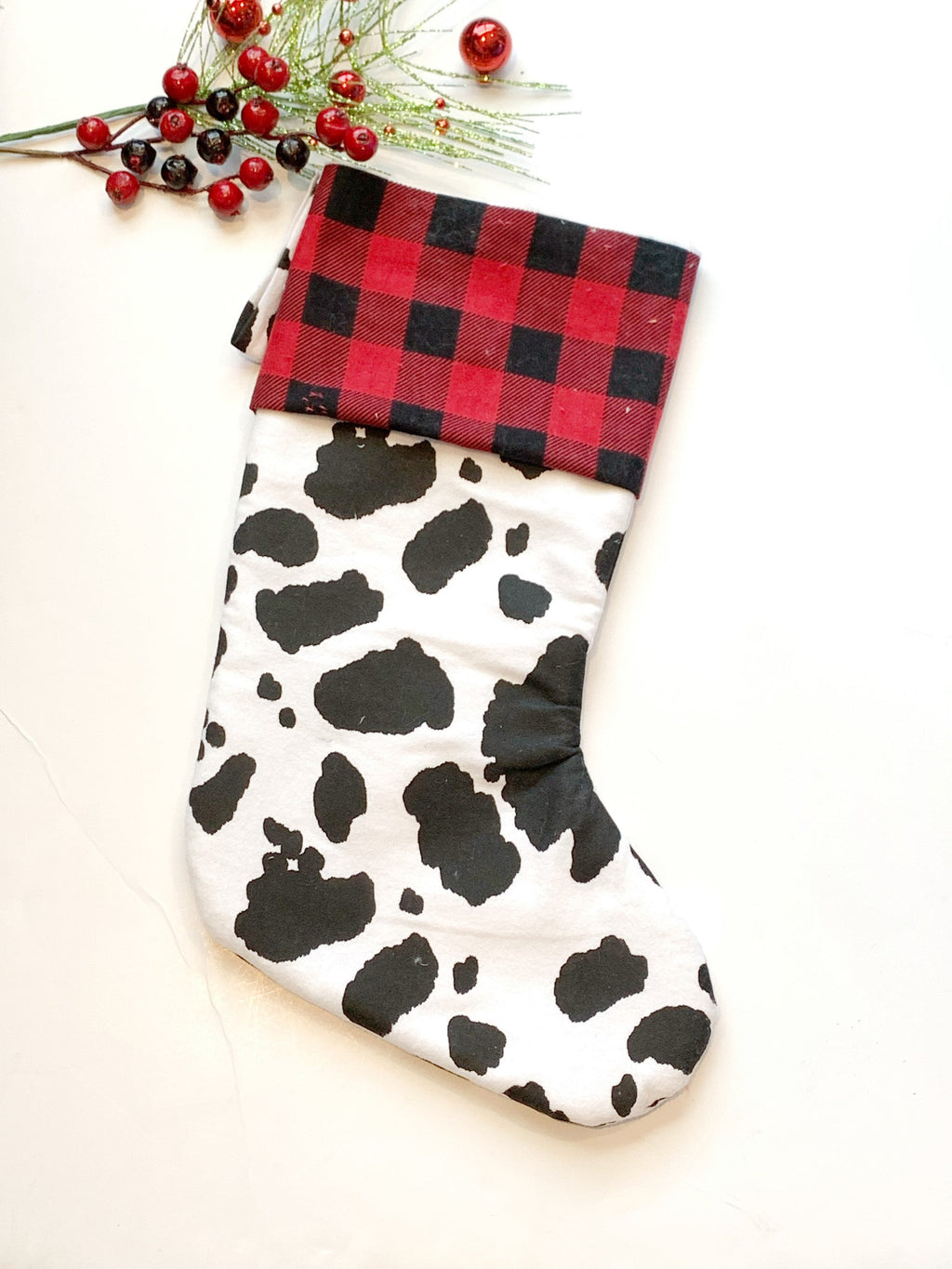 Personalized Christmas stocking in flannel cow spot print fabric, fully lined with minky dot cuff, 18” length, unique stocking, choose cuff