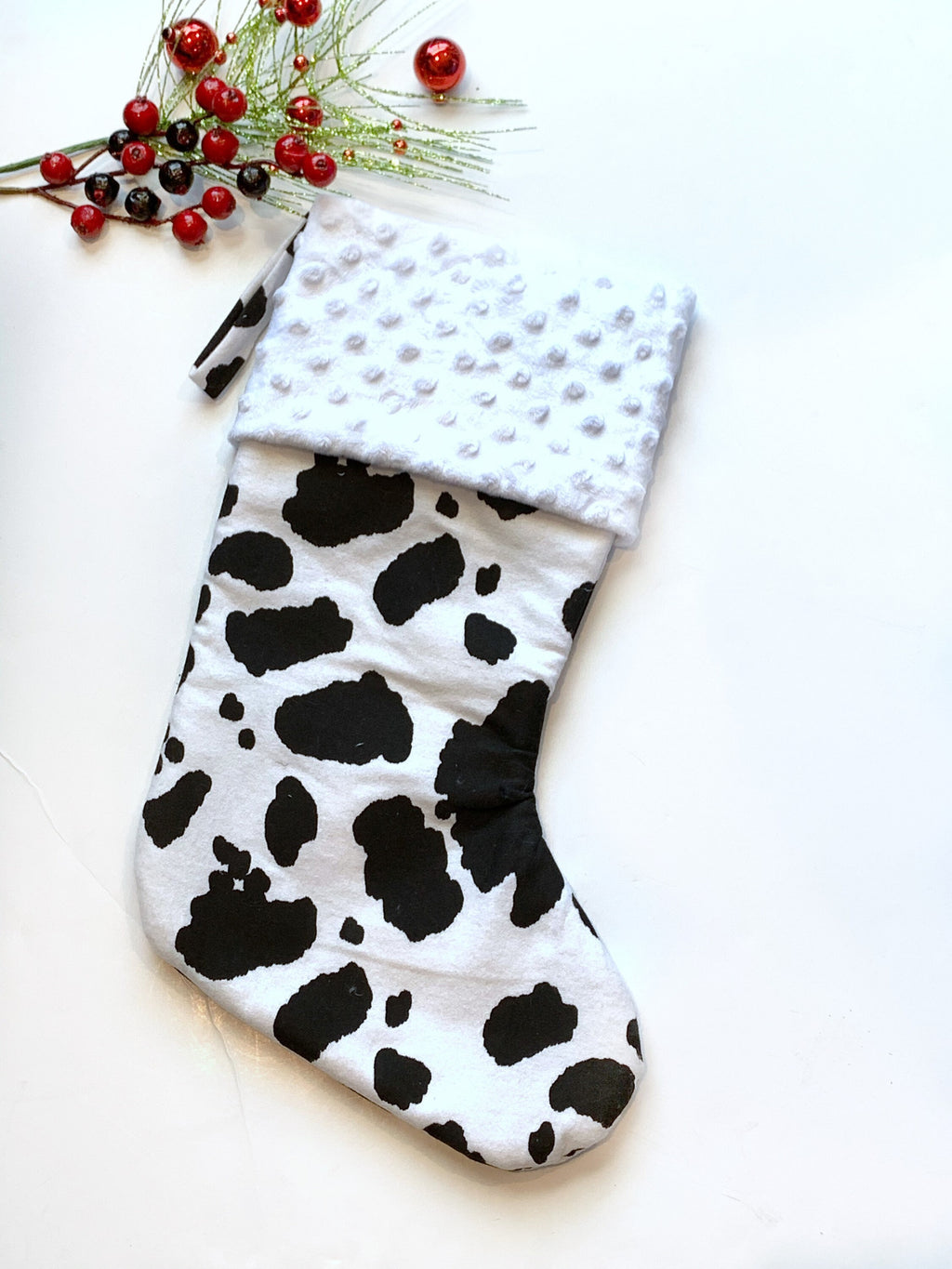 Personalized Christmas stocking in flannel cow spot print fabric, fully lined with minky dot cuff, 18” length, unique stocking, choose cuff