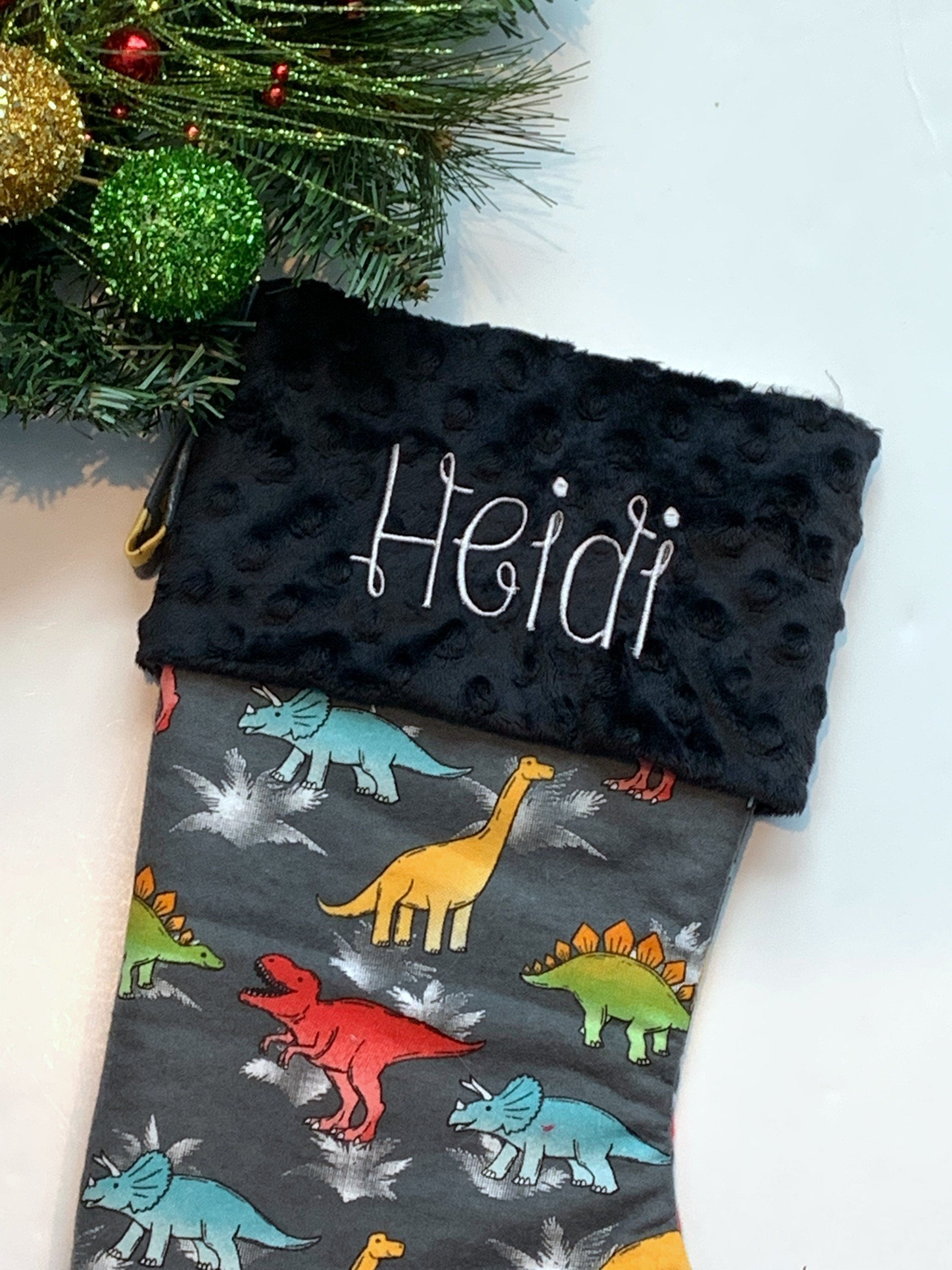 Personalized Christmas stocking in flannel dinosaur  fabric, fully lined with minky dot cuff, 18” length, unique child stocking