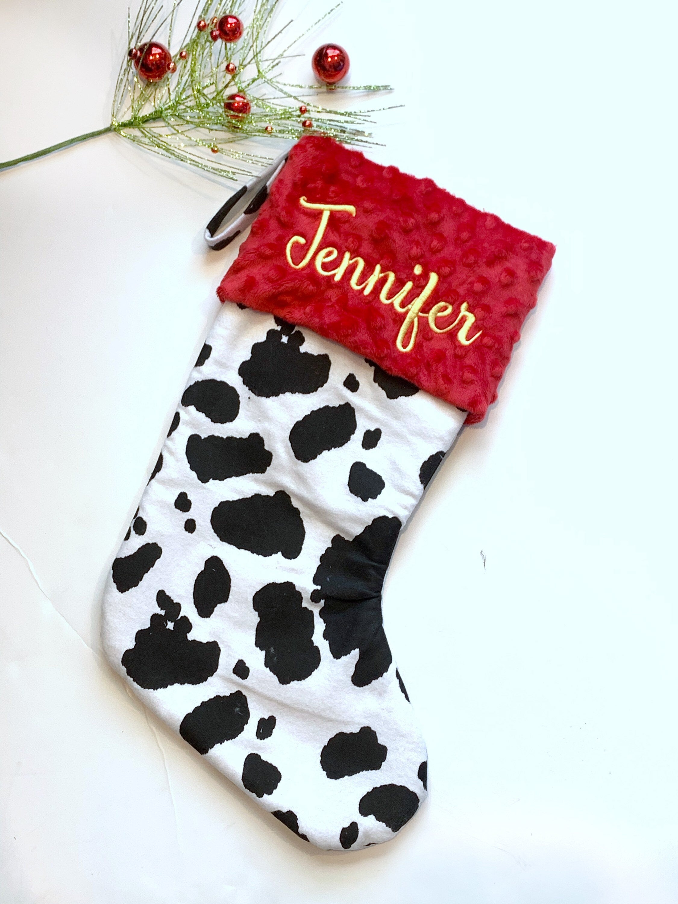 Personalized Christmas stocking in flannel cow spot print fabric, fully lined with minky dot cuff, 18” length, unique stocking, choose cuff