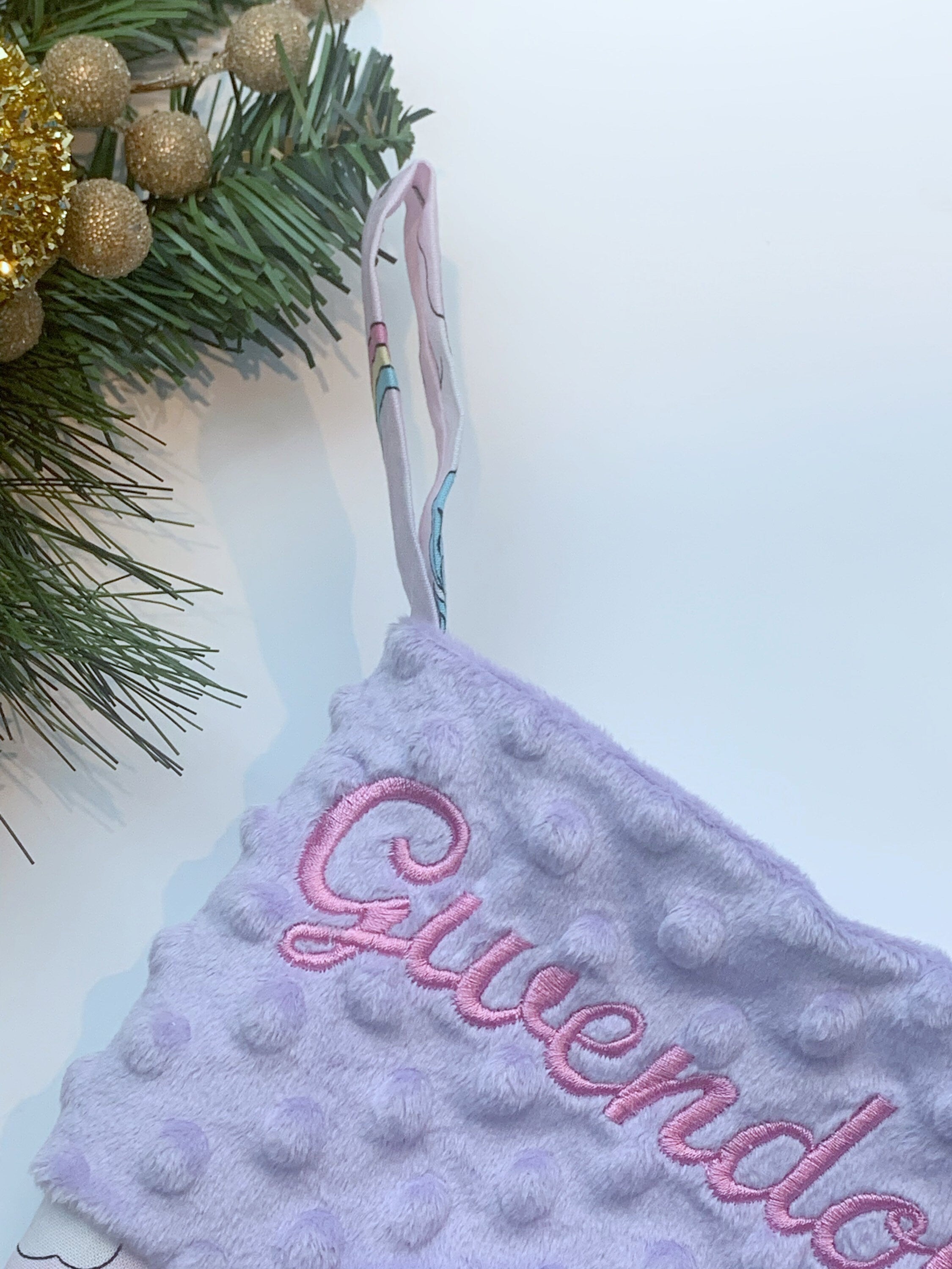 Personalized Christmas stocking in pink lavender unicorns and rainbow fabric, fully lined with minky dot cuff, 18”, unique for all ages