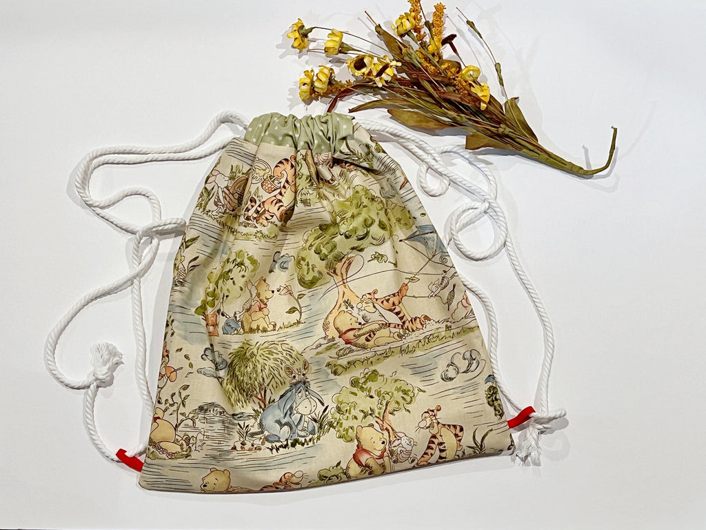 Drawstring backpack bag made from Winnie the Pooh fabric, convenient sturdy baby toddler carry all bag for mom, baby, school age 15” x 13.5”