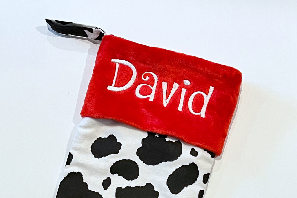 Personalized Christmas stocking in flannel cow spot print fabric, fully lined with minky dot cuff, 18” length, unique stocking, choose cuff