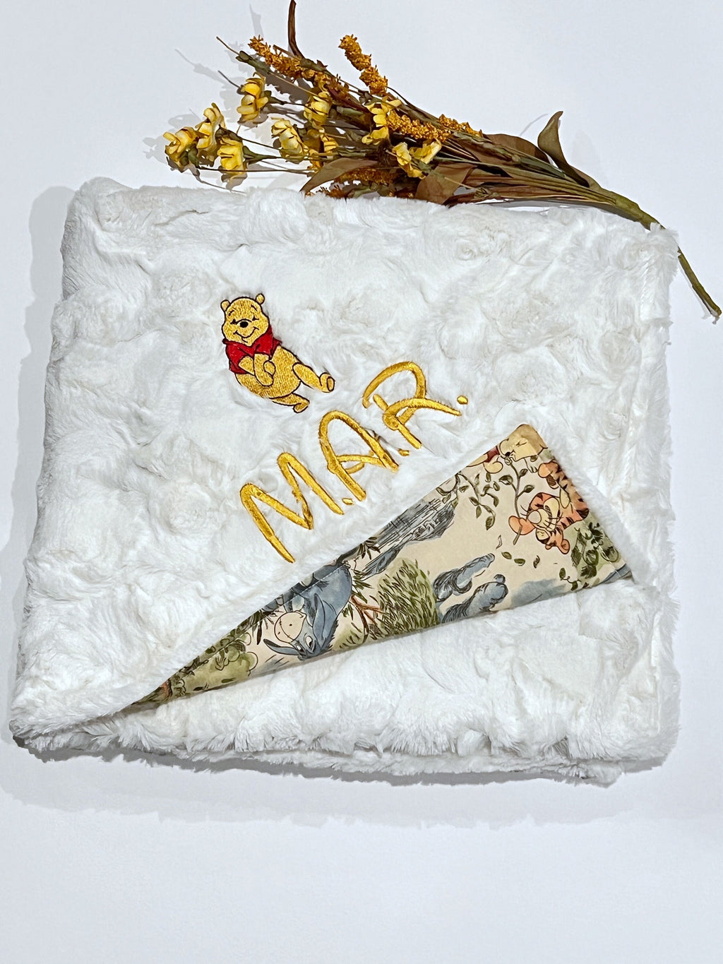 Personalized baby nursery blanket made from Winnie the Pooh fabric for boy or girl, cotton and minky or fur with Winnie embroidered option