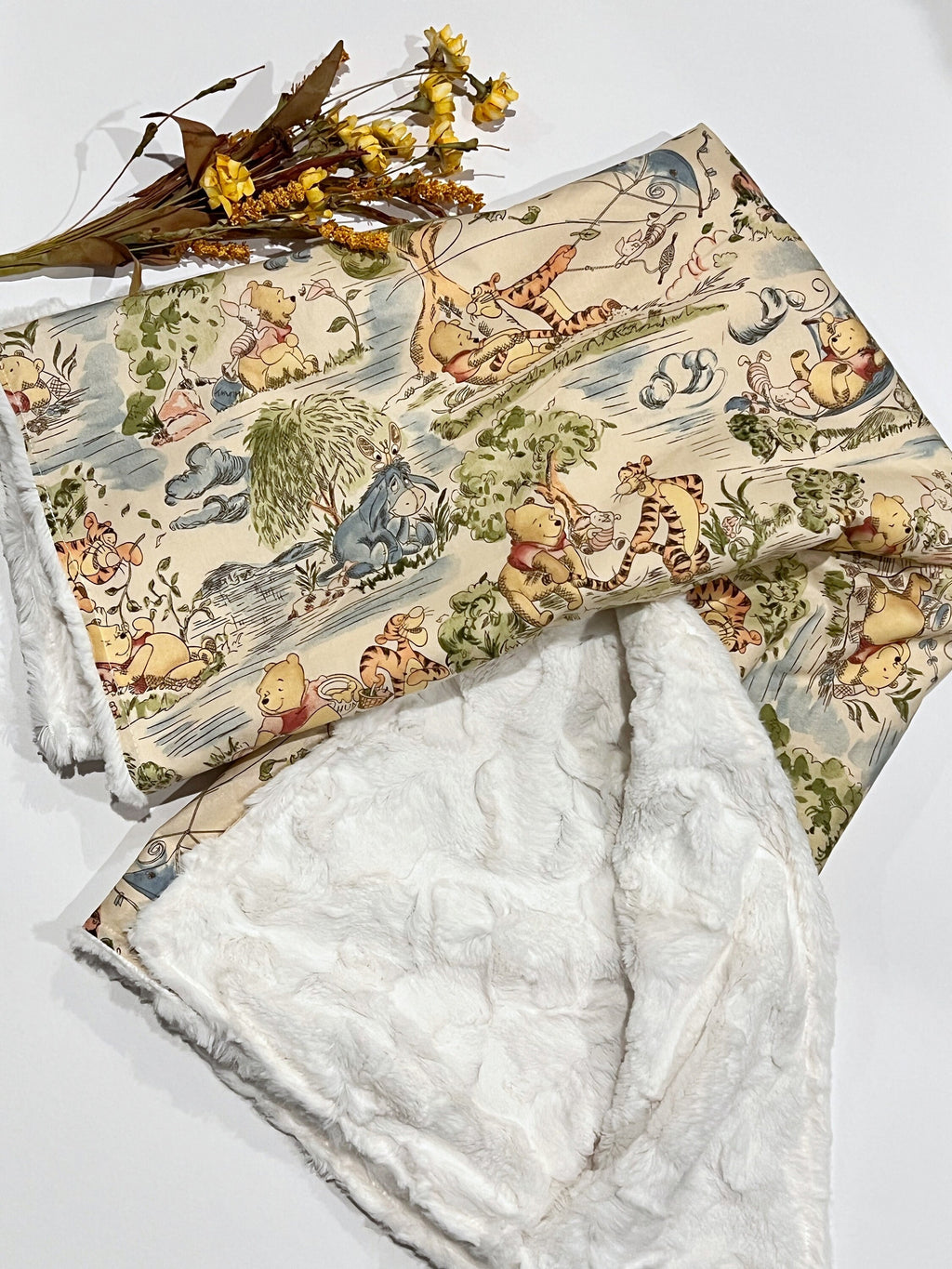 Personalized baby nursery blanket made from Winnie the Pooh fabric for boy or girl, cotton and minky or fur with Winnie embroidered option