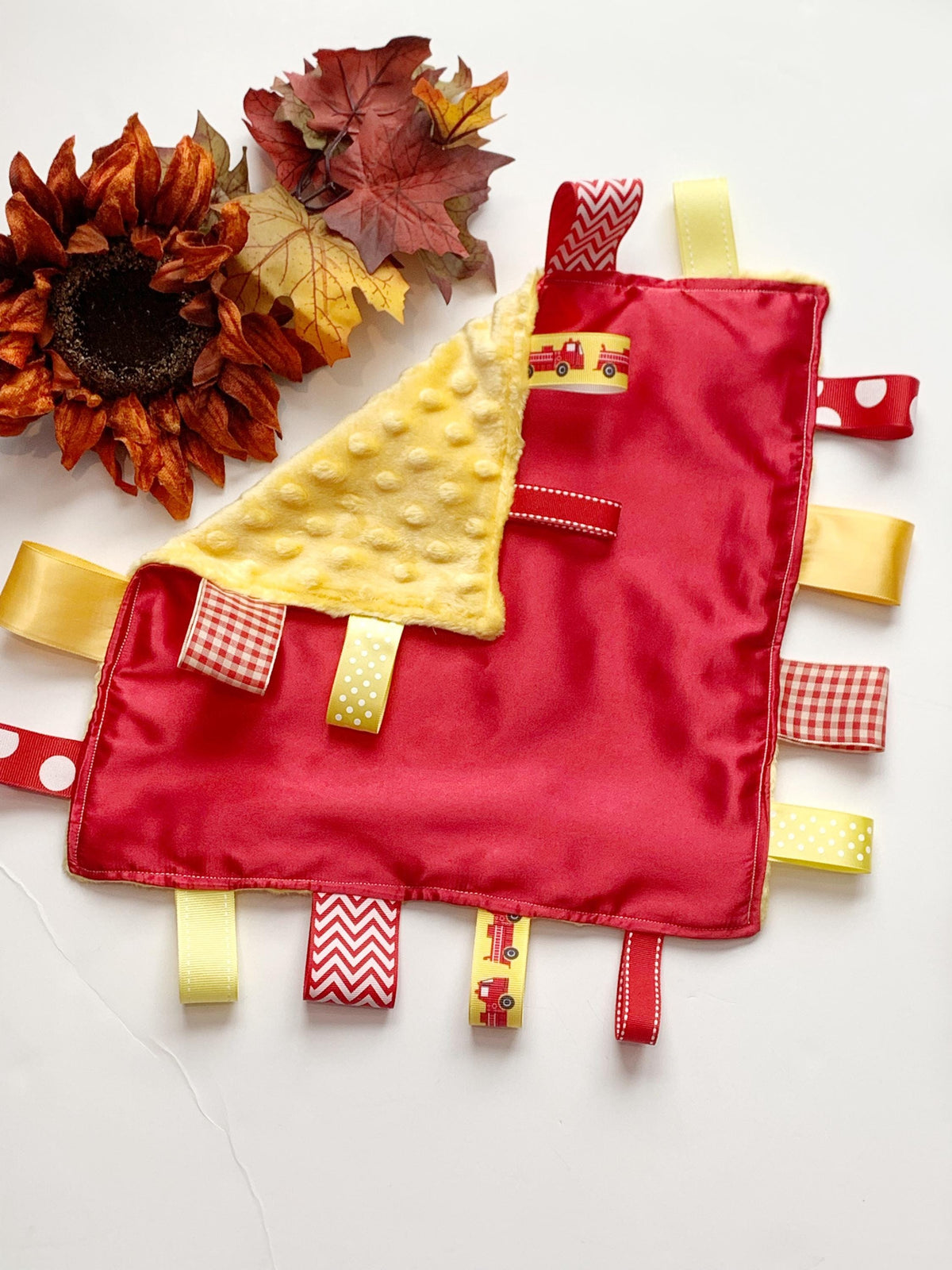 Satin and minky ribbon tag lovey in holiday red and black, personalized sensory toy for baby girl or boy 12" size, more colors