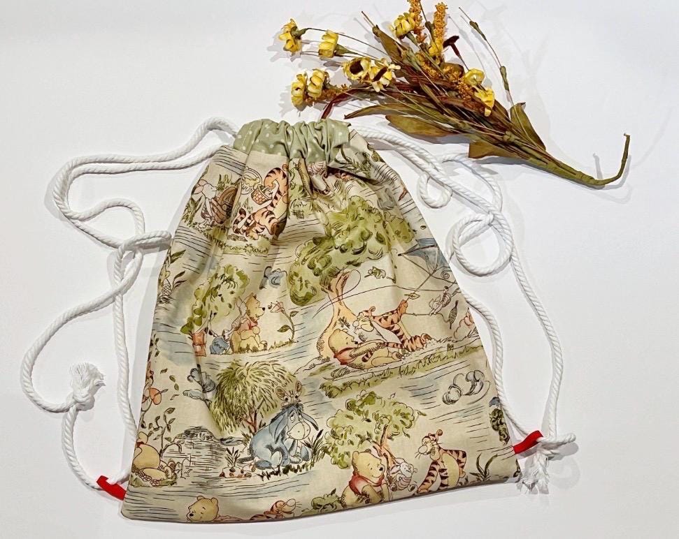Drawstring backpack bag made from Winnie the Pooh fabric, convenient sturdy baby toddler carry all bag for mom, baby, school age 15” x 13.5”