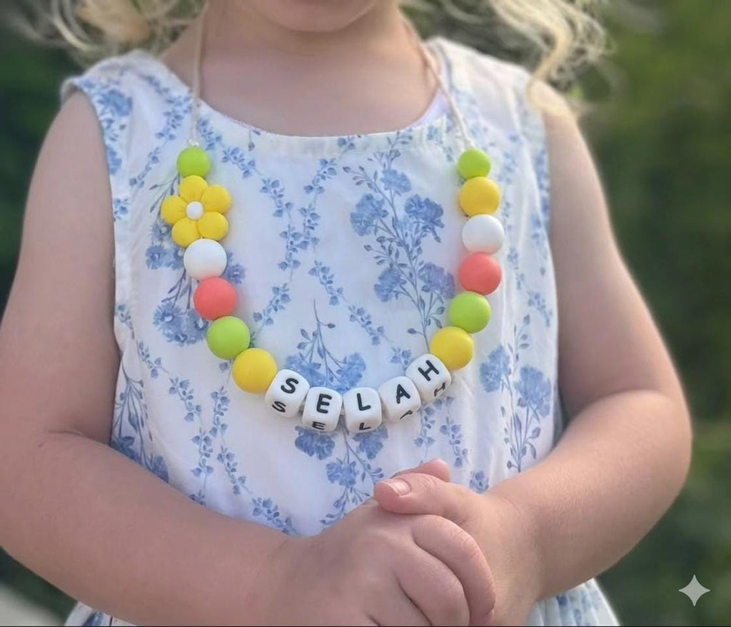 Toddler or child personalized necklace made from baby safe silicone beads, safe release clasp, colorful, plus a character or unique bead