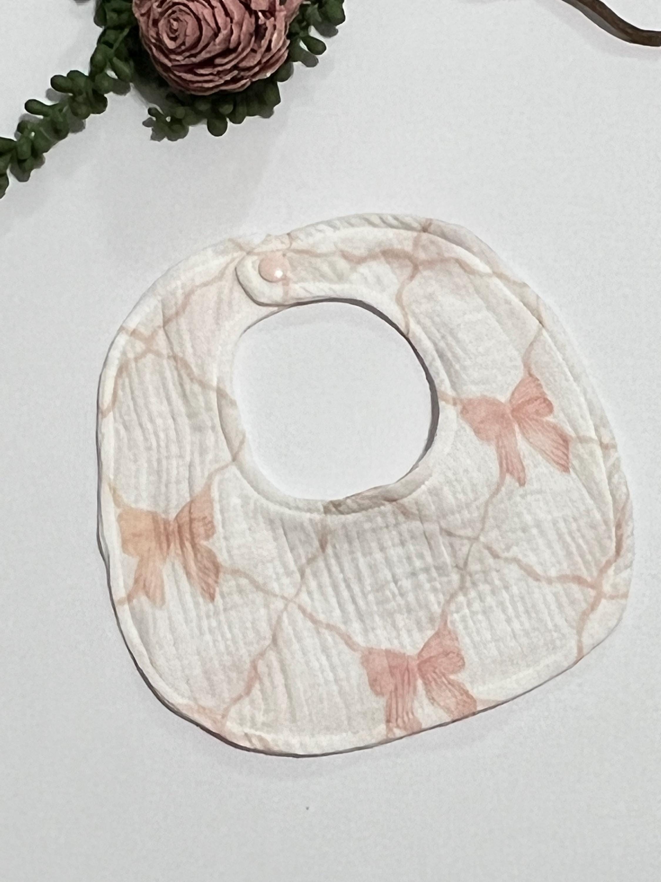 Baby drool bib in classic Winnie the Pooh, pink bow or woodlands print muslin gauze absorbant soft fabric with snap closure, lightweight