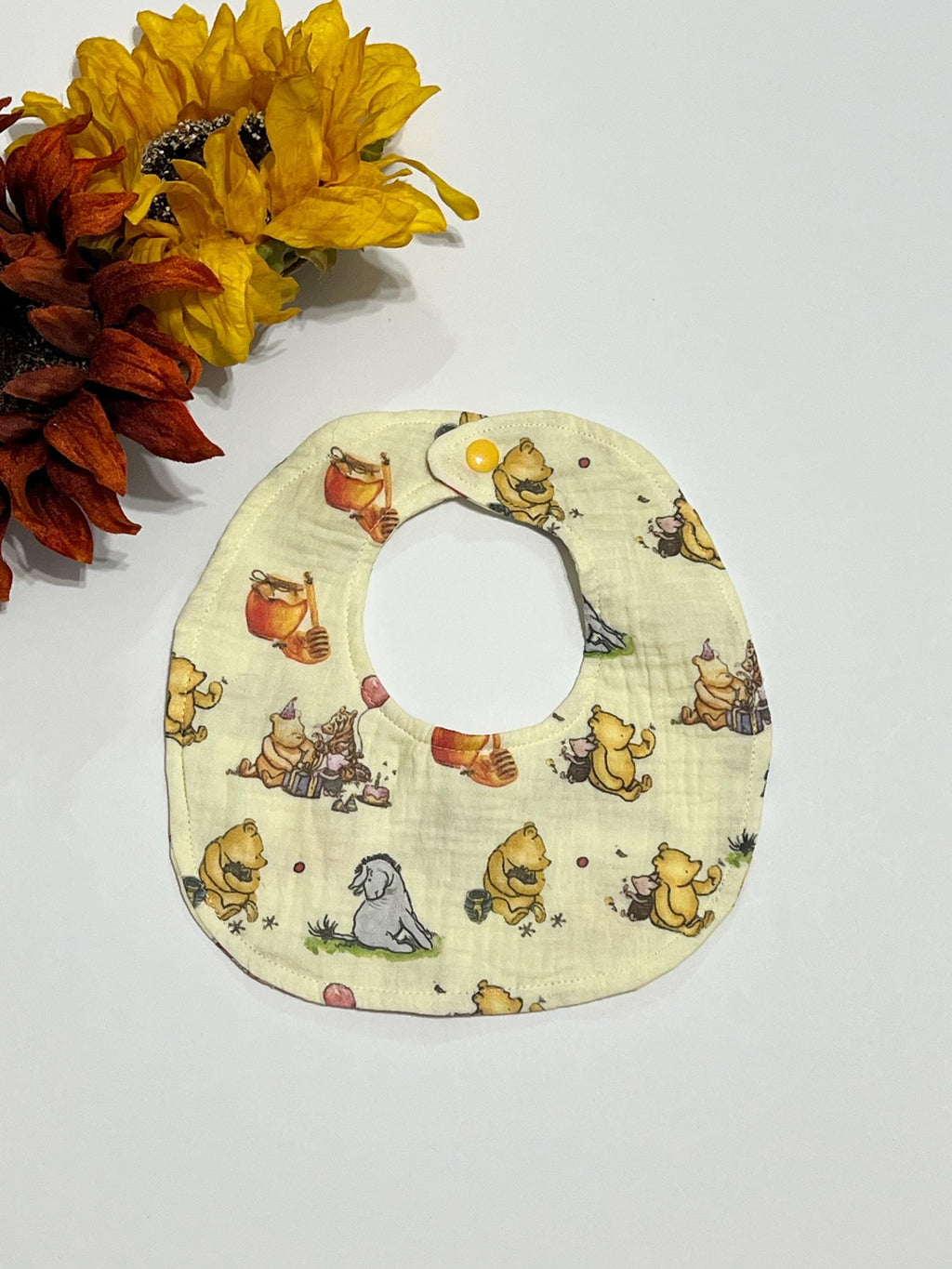 Baby drool bib in classic Winnie the Pooh, pink bow or woodlands print muslin gauze absorbant soft fabric with snap closure, lightweight