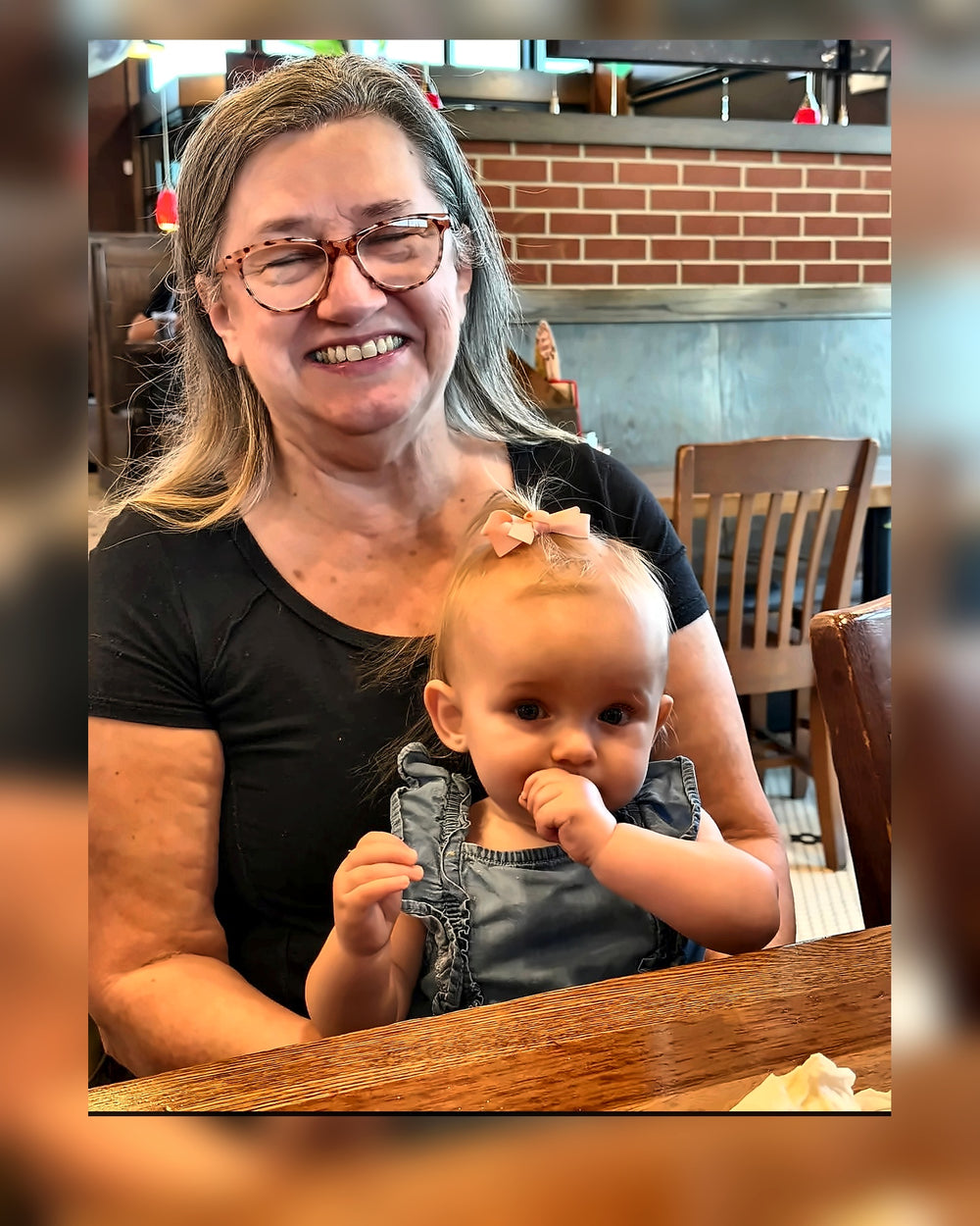 Paisley Junction store owner with handmade baby gifts