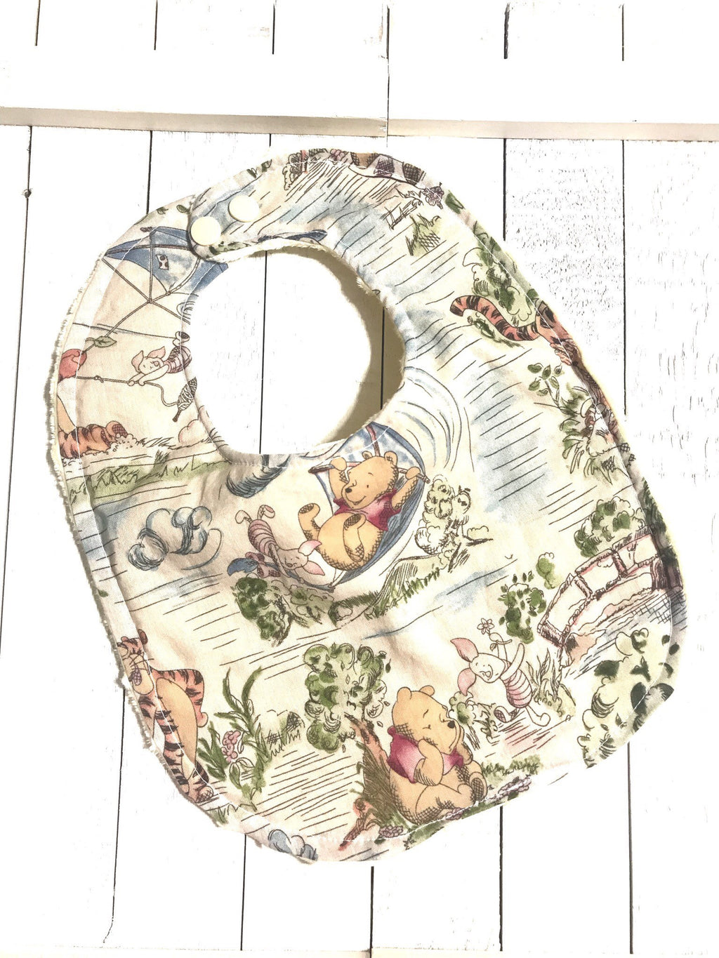 Baby toddler bib made from Winnie the Pooh fabric | Choose One | Reversible bib | gender neutral | Cotton and Minky | baby shower gift