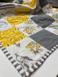 Baby crib quilt blanket made from Winnie the Pooh fabric for girl boy, can personalize this nursery bedding with cotton trim, perfect baby gift, measures 35” x 45”